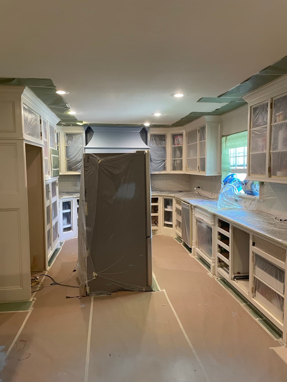 Cabinets masked for refinishing